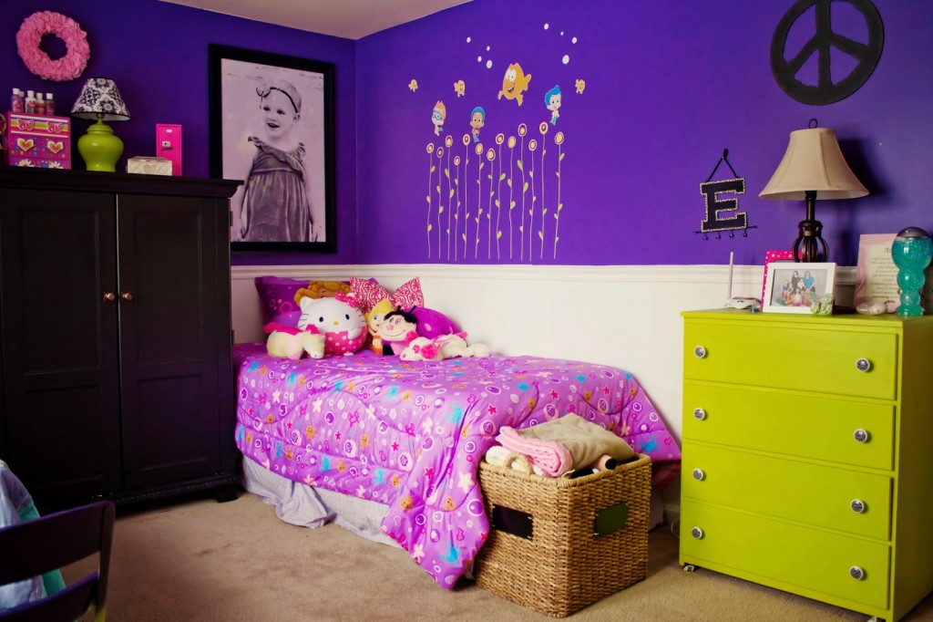astonishing-little-girl-bedroom-with-purple-bedding-set-cute-pillows-green-drawers-black-wardrobe-while-the-upper-walls-have-bold-purple-color-and-white-beadboard-on-the-lower-parts